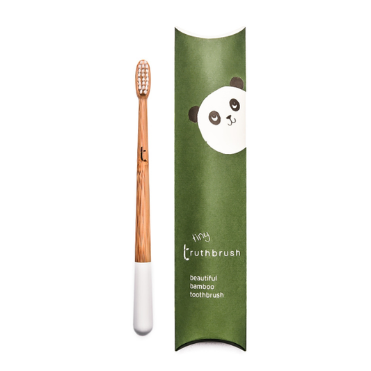 Cloud White Tiny Truthbrush with soft bristles